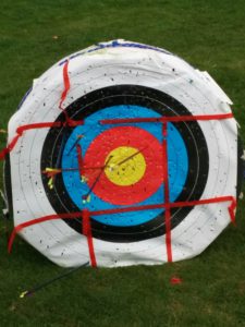 Target with 7 arrows, 3 or 4 of which are mine.